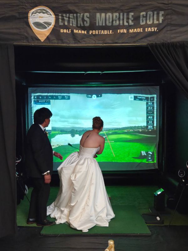 Mobile golf simulator at a Utah wedding